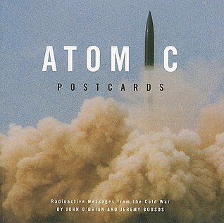 The cover of a book called Atomic Postcards, with a missile forming the letter "I" in the title.